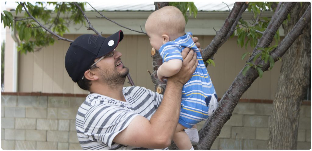 Man holding baby